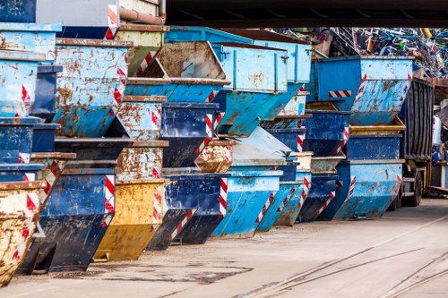 North London waste collection trucks in action