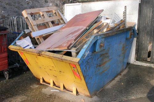 Workers efficiently removing household waste in Turnpike Lane