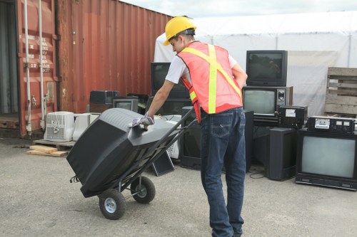 Professional team sorting and removing household waste